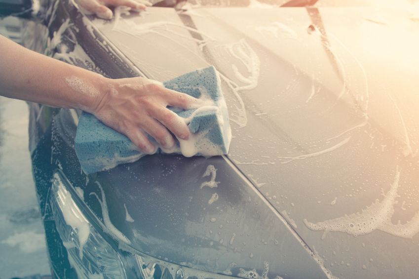 Man washing his car